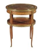 A mahogany and gilt brass mounted gueridon in Louis XV/XVI transitional style