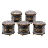 A set of five moulded and cut glass and brass mounted humidors