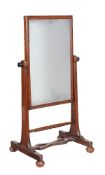 An early Victorian mahogany cheval mirror