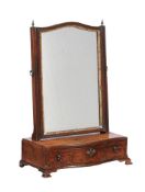 A mahogany and parcel gilt dressing mirror in George II style