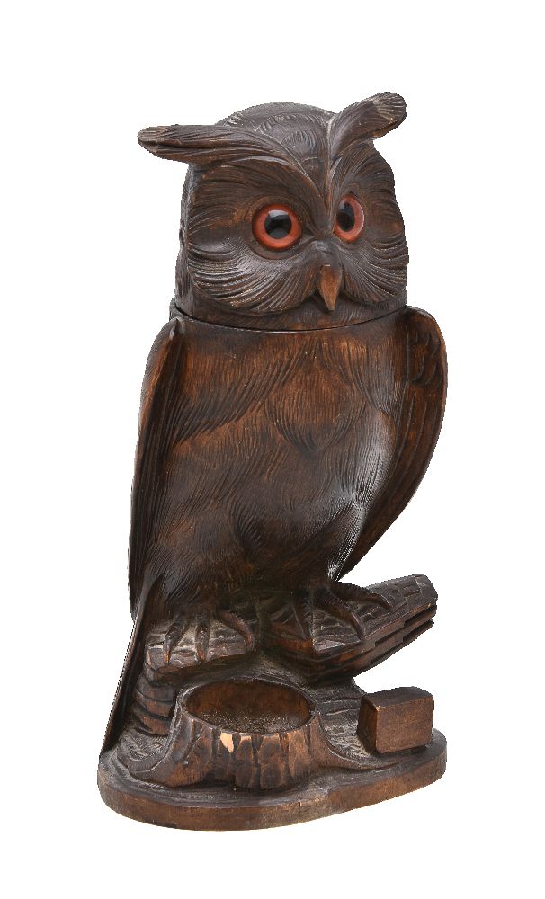 A 'Black Forest' carved and stained wood tobacco jar modelled as an owl