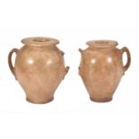 A pair of Egyptian carved alabaster vessels