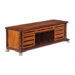 ϒ A mahogany, rosewood, and satinwood table cabinet/desk tidy