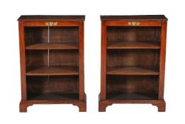 A pair of mahogany dwarf open bookcases