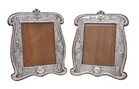 A pair of Arts and Crafts silver photograph frames by William Neale & Son
