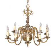 A pair of brass ten light chandeliers in German 18th century style