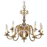 A pair of brass ten light chandeliers in German 18th century style