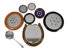 A group of various wall mirrors