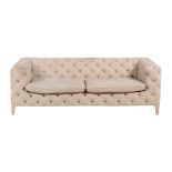 A button upholstered sofa