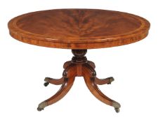 A George IV mahogany and walnut banded centre table