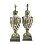 A pair of Limoges porcelain spirally fluted green-ground and gilt urn-shaped lamp bases