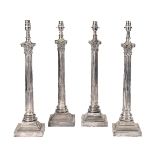 Four electro-plated metal columnar table lamps