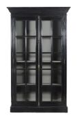 A French ebonized and glazed bookcase vitrine