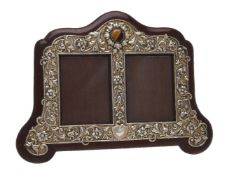 A Victorian silver parcel gilt and tiger's eye double photograph frame by John Septimus Beresford