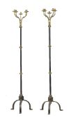 A pair of brass mounted and painted cast iron five light standard lamps