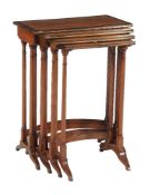 ϒ A nest of Regency mahogany, rosewood banded, and brass inlaid quartetto tables