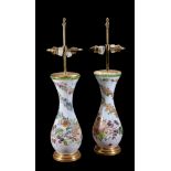 A pair of French opaque-white glass and enamelled pear-shaped vases with gilt-wood mounts