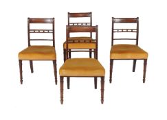 A set of nine Regency mahogany dining chairs