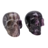 Two carved fluorspar (fluorite) models of human skulls