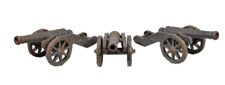 A set of three cast iron models of field cannon