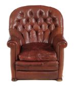 A leather button upholstered armchair
