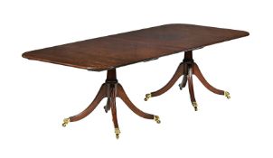 A mahogany twin pedestal dining table