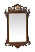 A George III mahogany fretwork wall mirror