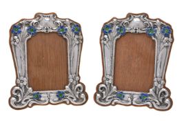 A matched pair of Art Nouveau silver photograph frames