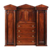 An early Victorian mahogany compactum wardrobe