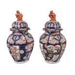 A pair of Japanese Imari porcelain vases