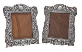 A pair of Edwardian silver photograph frames by William Neale & Sons