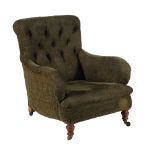 A late Victorian mahogany and upholstered armchair
