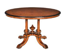 An Aesthetic Movement burr walnut and ebonised oval centre table