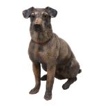 An Austrian painted terracotta model of a seated dog