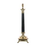 A pair of gilt metal mounted moulded glass columnar table lamps