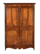 A mahogany press cupboard