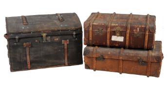 Two vintage leather travelling trunks