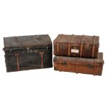 Two vintage leather travelling trunks