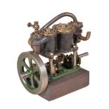 A vintage model of a live steam compound two cylinder vertical engine