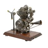 An exhibition standard ½ size working model of a 44cc OHC Internal combustion motor cycle engine