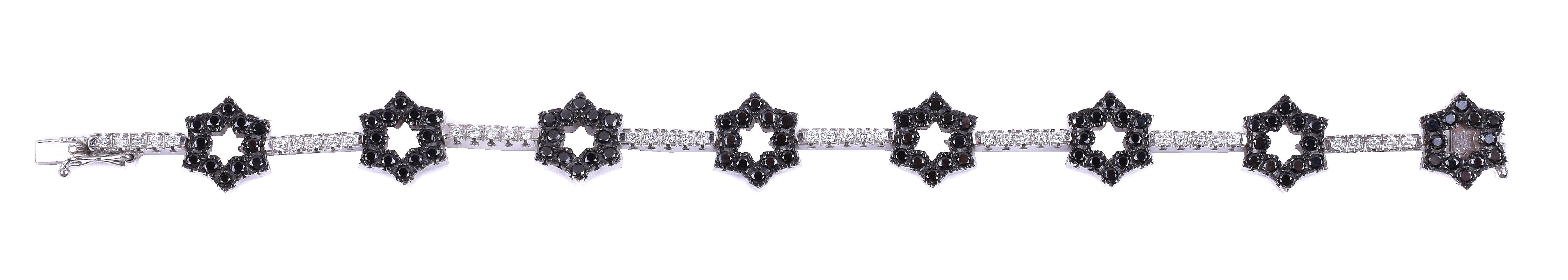 A diamond and black diamond bracelet