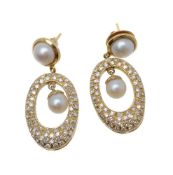 A pair of diamond and cultured pearl earrings