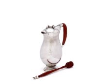 ϒ Georg Jensen, a Danish silver baluster chocolate pot or pitcher