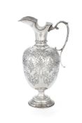 A Victorian silver claret jug by Atkin Brothers