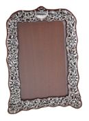An Art Nouveau silver large photograph frame by William Comyns & Sons