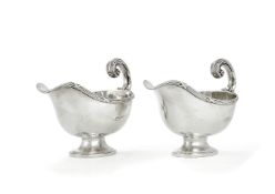 A pair of Edwardian silver oval sauceboats by C. J. Vander