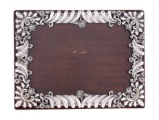 A late Victorian silver photograph frame by William Comyns & Sons