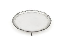 A silver shaped circular salver by Collingwood & Co.