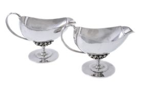 Georg Jensen, a pair of Danish silver cream boats