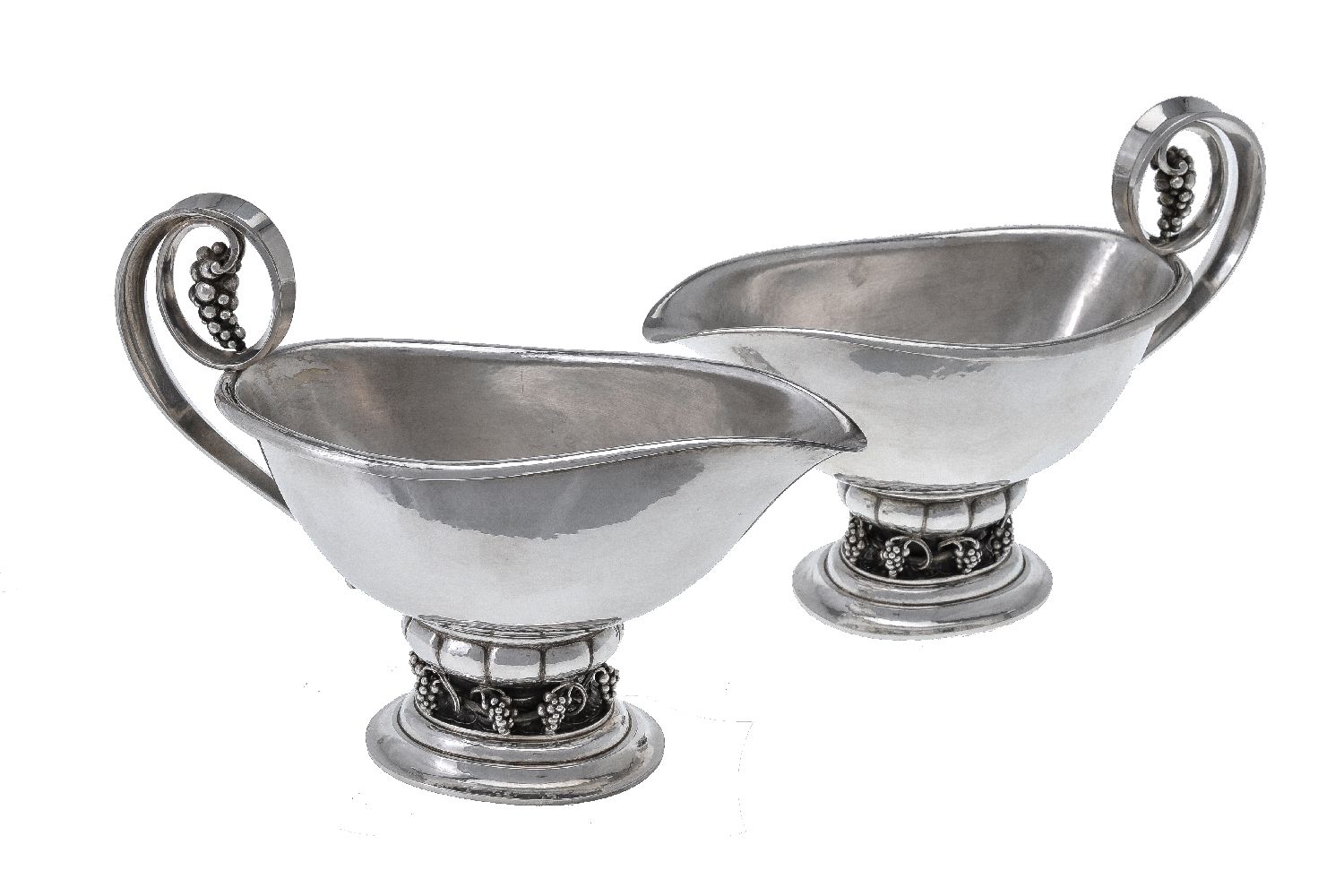 Georg Jensen, a pair of Danish silver Grape pattern sauce or gravy boats